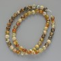 חרוזי אגאט צהוב חלקים כדוריים, קוטר 6 מ״מ ±, אורך 38 ס״מ ± על חוט