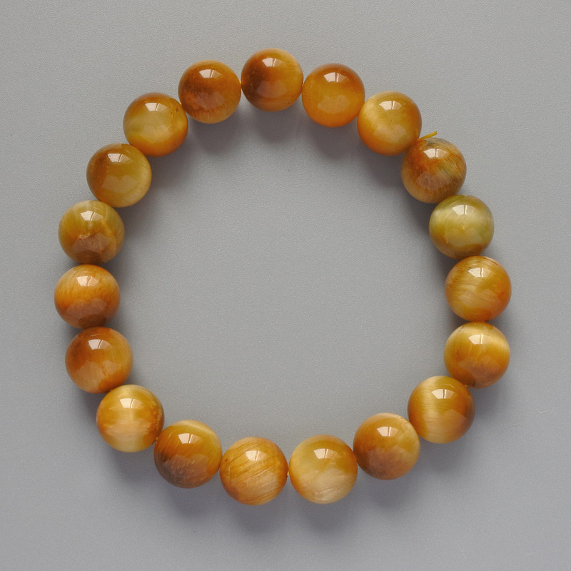 צמיד אבן עין חתול צהובה מאבן טבעית – חרוזים חלקים בקוטר 10 מ״מ, אורך 18 ס״מ+- (אלסטי)