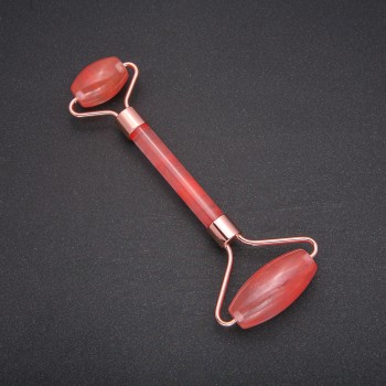 מסאז' גלילי מאבן חלצדון, מתכת זהובה, אורך 14,5 מ״מ