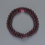 חרוזי טורמלין חלקים בצורת כדור, קוטר 6.5 מ״מ, אורך כ-38 ס״מ על החוט