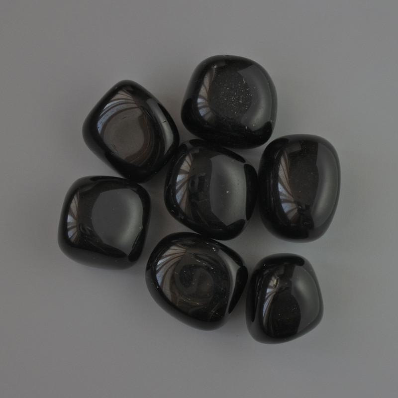 אבן מזכרת טבעית אגט שחור מלוטשת, קוטר 22×20–22 מ״מ (+‑), אריזה 100 גרם