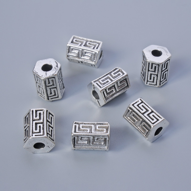 אביזרי חרוז-הכנסה, קוטר 10×7 מ״מ, קוטר פתח 2,9 מ״מ, אריזה 7 יחידות +- 20 גרם+- צבע כסף למתכת
