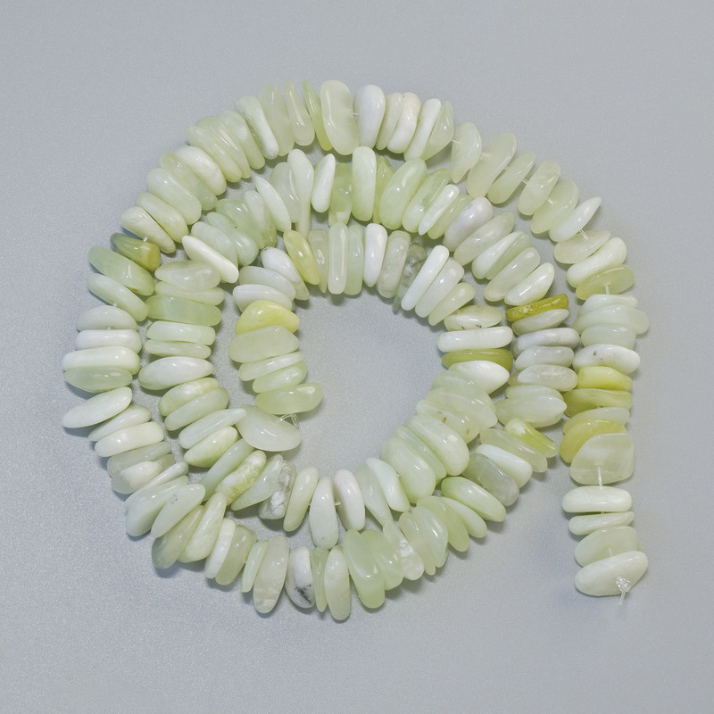 חרוזי אוניקס טבעיים — גרגרי אבן, קוטר 10×3 מ״מ, אורך 40 ס״מ על חוט