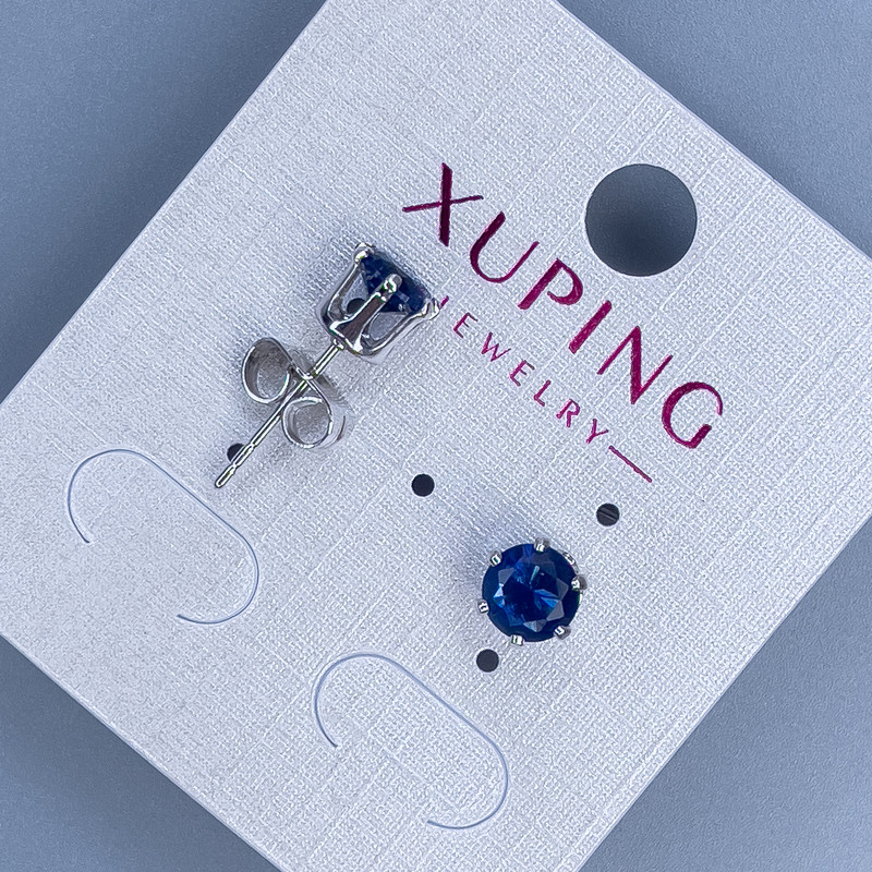 עגילי סטוד כדוריים Xuping עם אבן כחולה במסגרת «כתר» 6 מ״מ +- רודיום