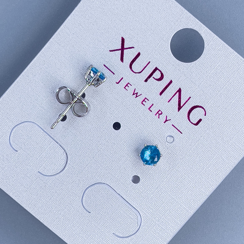 עגילי צמודים Xuping עם אבן כחולה בקוטר כ-4 מ״מ — ורודיום