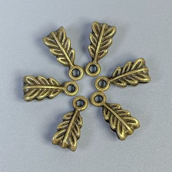 אביזרי בייל בצבע ברונזה, גודל 14×7×5 מ״מ ± פתחים כ-2.5 מ״מ וכ-1.8 מ״מ ±, אריזה 22 יחידות