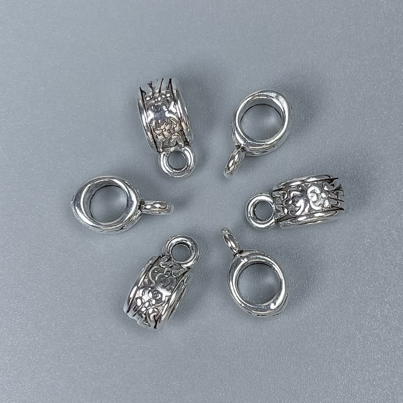 אביזרי פרזול בייל בצבע כסף, ממדים 11×5×6 מ״מ ± פתחי חור, קוטר 4,5 מ״מ ±, קוטר 2 מ״מ ± אריזה 20 יחידות