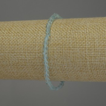 צמיד טופז טבעי, מטבע מלוטש בקוטר 4 מ״מ, אורך 18 ס״מ, בסיס אלסטי