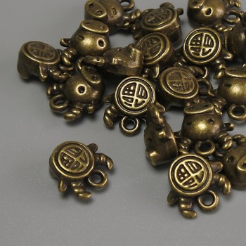 אביזר תלייה: שור בצבע ברונזה, מידות 10×9×5 מ״מ, פתח 1 מ״מ, אריזה 20 גרם (≈17 יחידות)