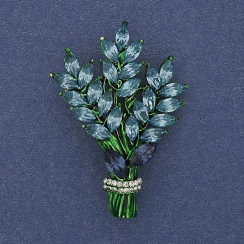 סיכה «ענף» עם קריסטלים תכלת ולבן ומתכת זהובה 43×29 מ״מ +