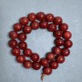 חרוזים מאבן יאשמה אדומה חלקה, קוטר 12 מ״מ ±, על חוט, אורך 38 ס״מ+