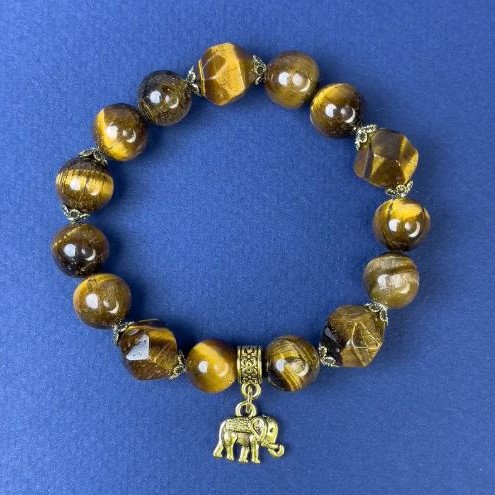 צמיד עין הנמר – גרגר חלק בקוטר 10 מ״מ +- וגרגר מגולף בקוטר 11 מ״م +-, אורך 18 ס״מ +- אלסטי