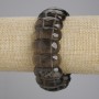 צמיד טופז מעושן – חוליות מגולפות, קוטר 25×11 מ״מ, אורך 18 ס״מ ±, אלסטי