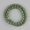 חרוזים מלבה וולקנית ירוקה, צילינדר, קוטר 8×8 mm ± על חוט, אורך 38 cm+