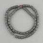 חרוזי המטיט הנקבובי בצורת גליל, קוטר 6×6 mm ±, אורך החוט כ-40 cm ± על חוט