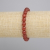 צמיד קרנליאן כדור מלוטש בפאות, קוטר 8mm+-, אורך 18cm+- סטרץ'