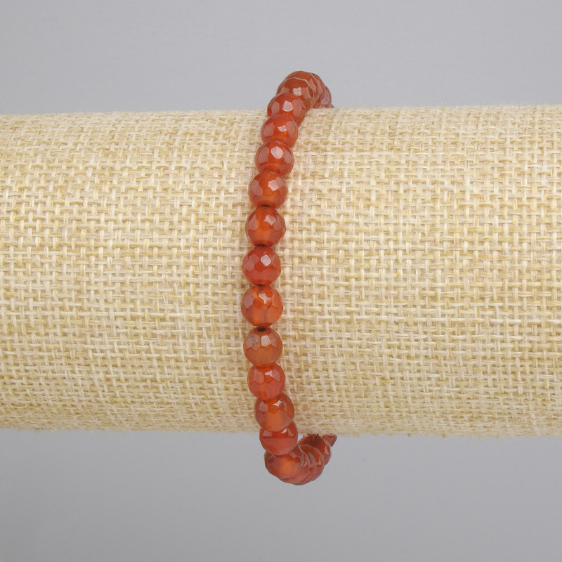צמיד קרנליאן כדור מלוטש בפאות, קוטר 6mm+-, אורך 18cm+- סטרץ'