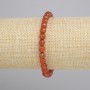 צמיד קרנליאן כדור מלוטש בפאות, קוטר 6mm+-, אורך 18cm+- סטרץ'