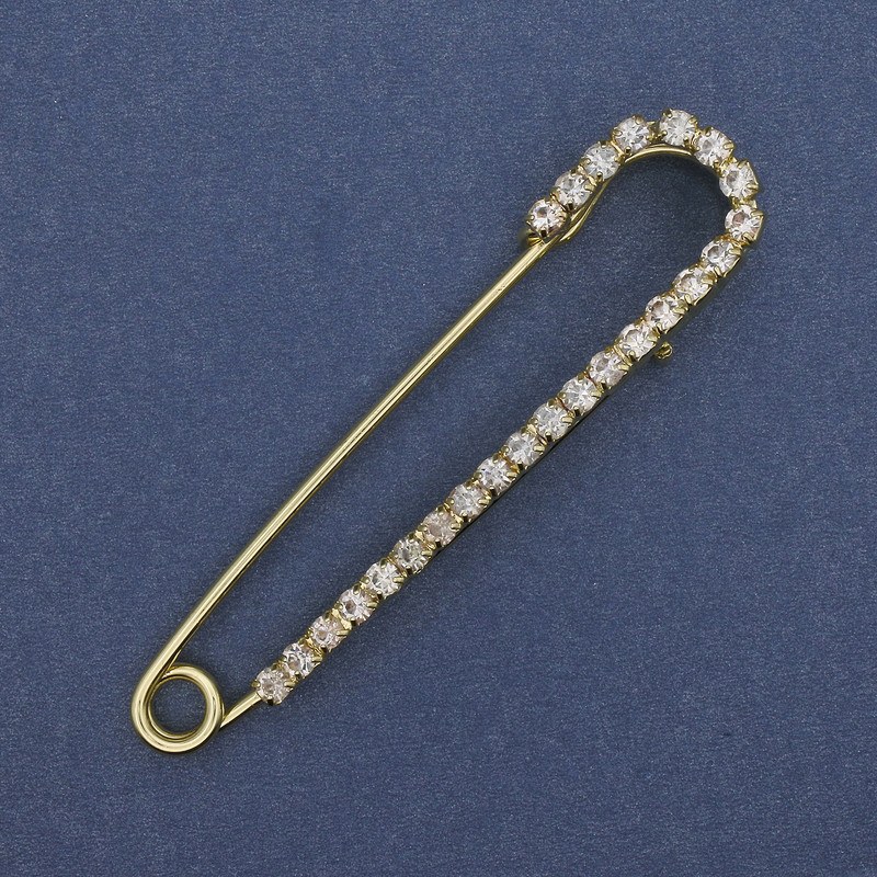 סיכת דש (סיכה) עם קריסטלים לבנים 72×16 mm ±, מתכת בצבע זהב