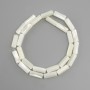 חרוזי פרלמוט בצורת גליל, קוטר 15×6 mm ±, אורך 39 cm ± על חוט
