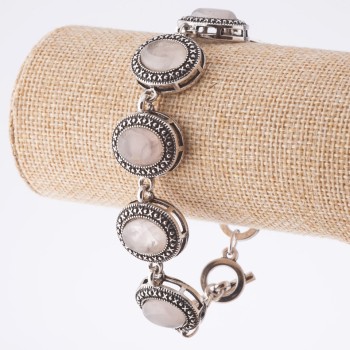 הנחה: צמיד קוורץ ורוד במסגרת «נקודה-צלב», 7 אבנים אובאליות 22×18 מ״מ, אורך 20–22 ס״מ