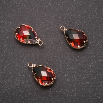 תליון \"טיפה\" בצבע ירוק-כתום, מסגרת זהובה 10×17 מ״מ