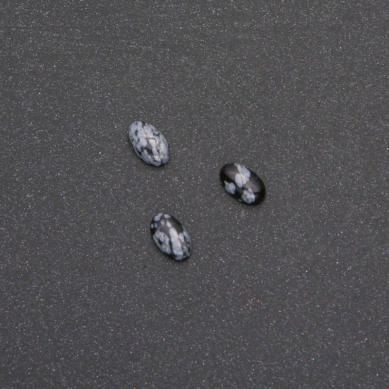 קאבושון מאבן אובסידיאן שלגי «דמעות האפאצ'י» 8×5 מ״מ