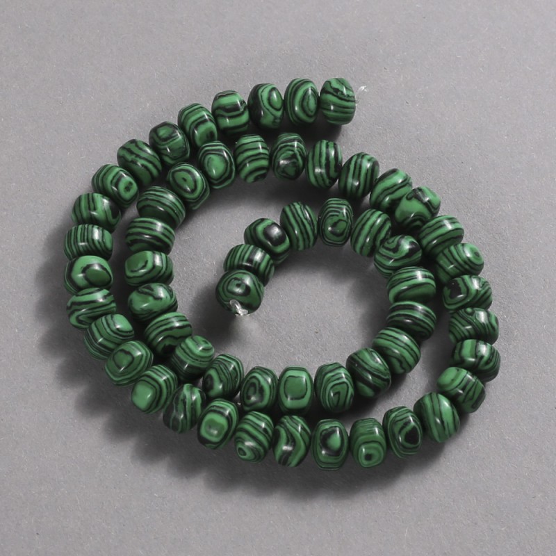 חרוזים על חוט מלכיט (מדוחס) — רונדל חלק, קוטר 9×7 מ״מ + -, אורך 39 ס״מ +