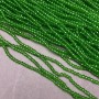 חרוזי קריסטל צ'כי על חוט ירוקים בהירים שקופים בצורת רונדל מחורץ, קוטר 3×2.5 מ״מ + -, אורך 36 ס״מ +