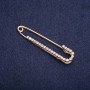 סיכת חזה-פין עם קריסטלים לבנים 57×13 mm מתכת בצבע זהב