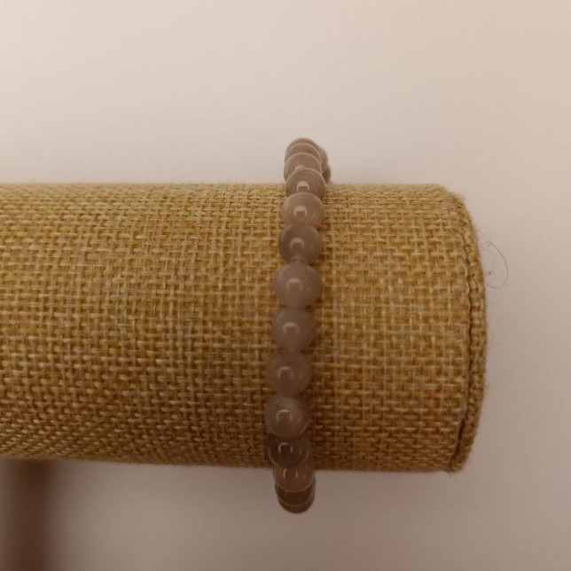 צמיד אלסטי מקווארץ בגוון אפור (אקريل מלאכותי), גרגר חלק, קוטר 6.5 מ״מ +/-, אורך 18 ס״מ+
