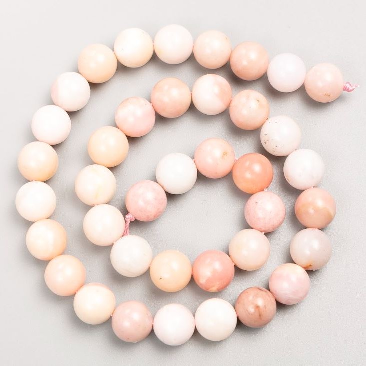 חרוזים על חוט מאבן טבעית – אופל ורוד, כדור חלק, קוטר 10 מ״מ, אורך 38 ס״מ +