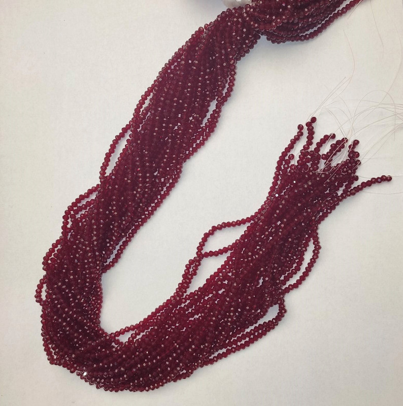 מחרוזות קריסטל צ'כי אדום-כהה שקוף מלוטש רונדל, קוטר 3×2.5 מ״מ, אורך 38 מ״מ, על חוט