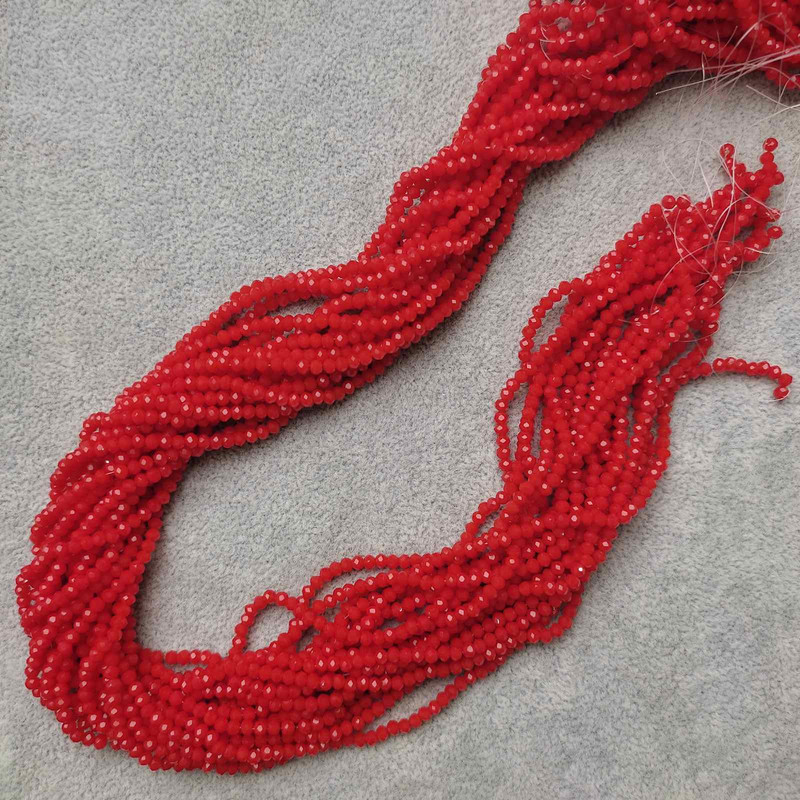 חרוזים מקריסטל צ'כי אדומים מגולפים בצורת רונדל, קוטר 3×2,5 מ״מ+- אורך 39 מ״מ+- על חוט