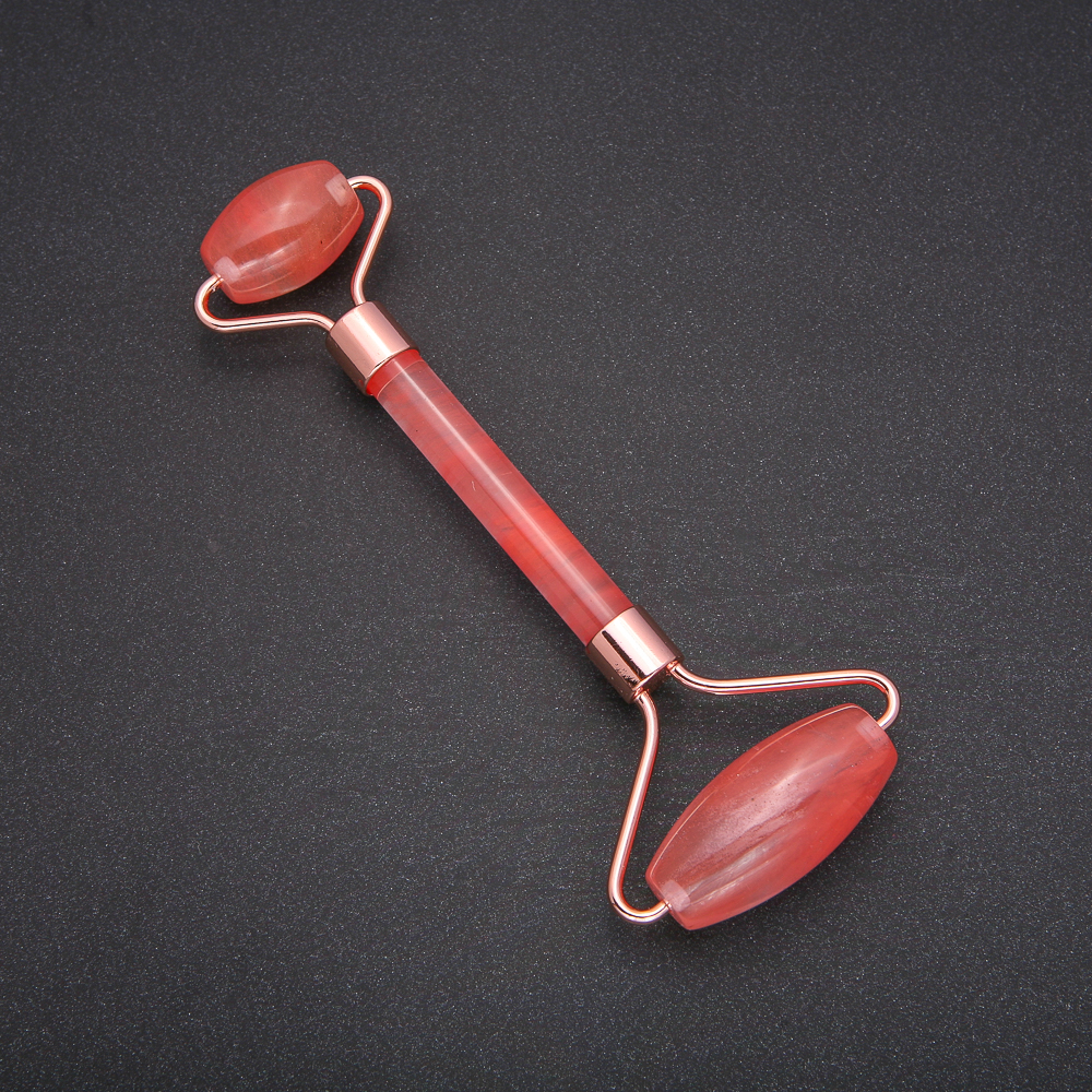 מסאז' גלילי מאבן חלצדון, מתכת זהובה, אורך 14,5 מ״מ