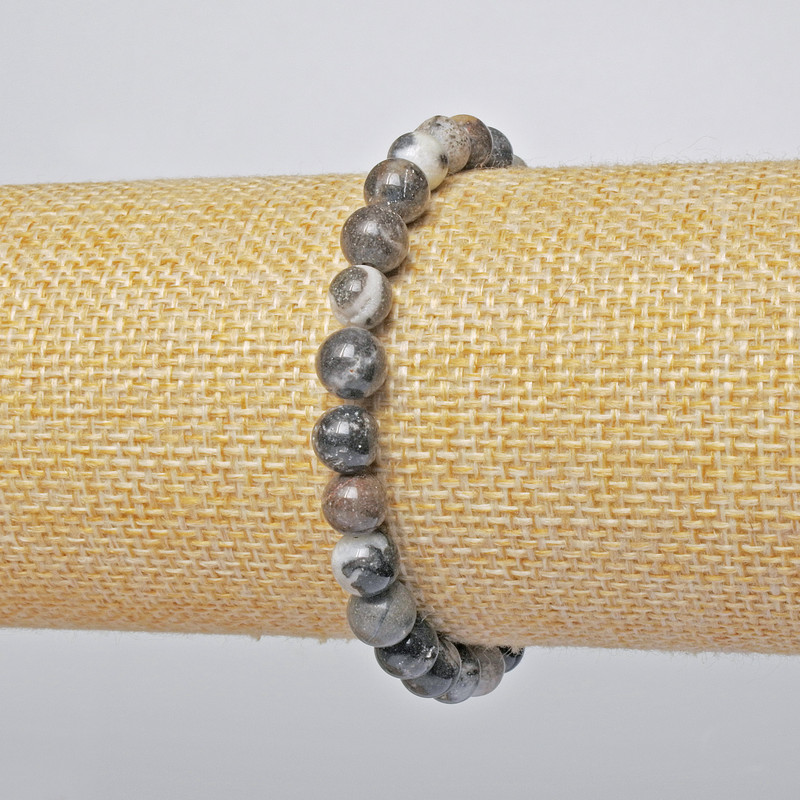 צמיד יאשמה טבעי, חרוזים חלקים, קוטר 6.5 מ״מ + -, אורך 18 ס״מ + - (מתיחה)