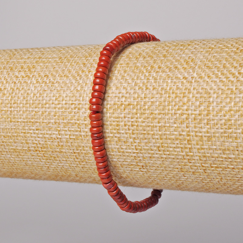 צמיד מג'ספר אדום טבעי חלקה בצורת רונדל, קוטר 4×2 מ״מ±, אורך 18 ס״מ± (אלסטי)