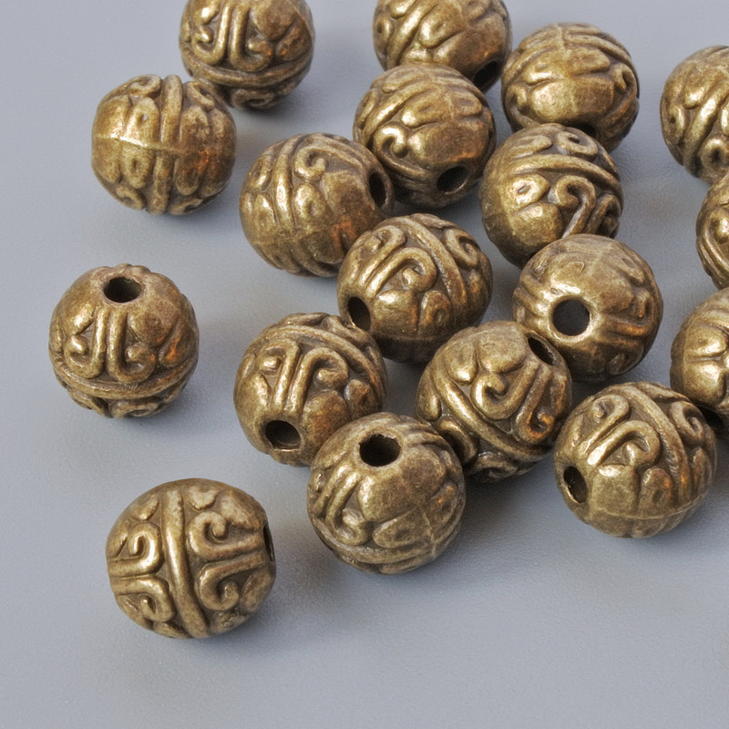 אביזרי חרוז-שיבוץ, קוטר 7 מ"מ, קוטר החור 1.7 מ"מ, אריזה 16 יחידות ±, צבע מתכת: ברונזה