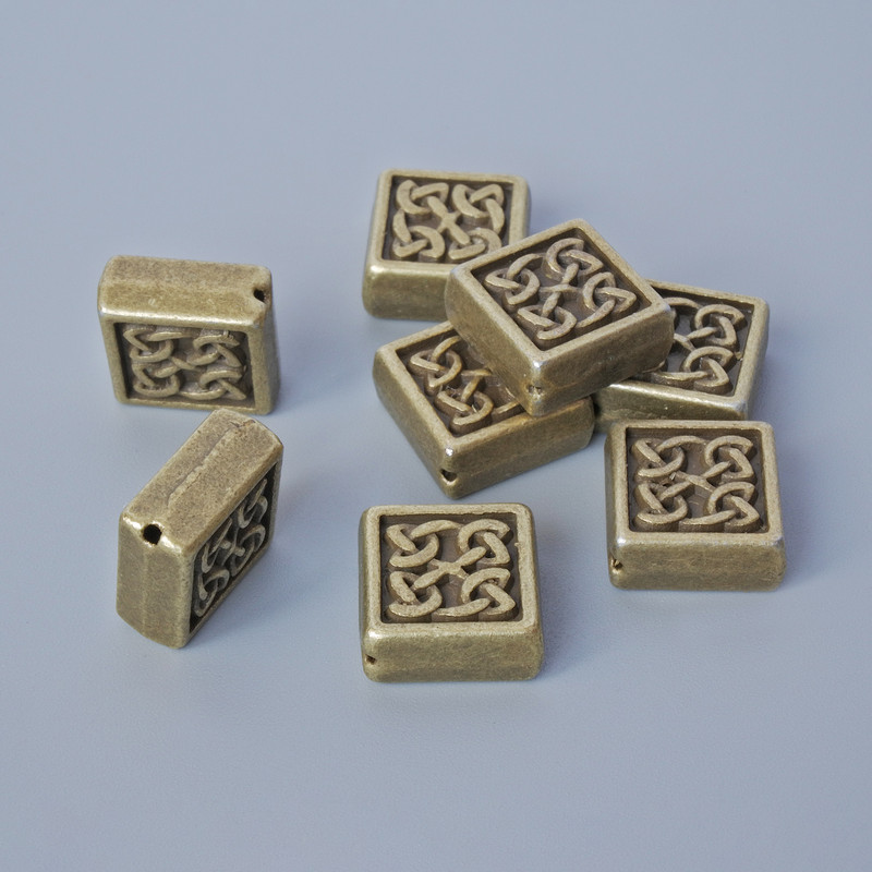 אביזרי חרוז-ההכנסה, קוטר 10,5×5 מ״מ, קוטר החור 0,7 מ״מ, אריזה 8 יח' ± בצבע ברונזה למתכת