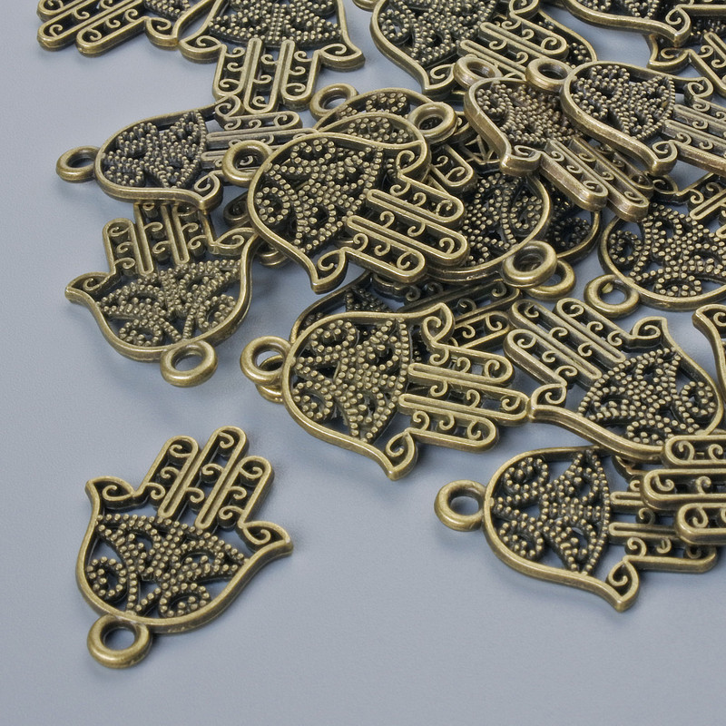 אביזרי פרזול תליון «חמסה», קוטר 21×15 מ״מ, קוטר פתח 1,7 מ״מ, האריזה 24 יח'± צבע מתכת ברונזה