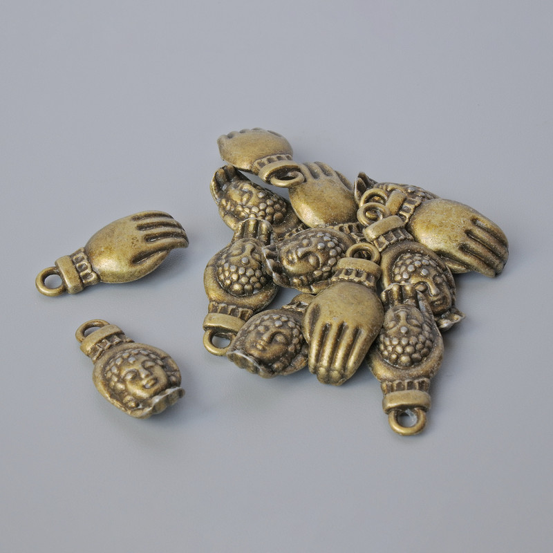 אביזרי תליה «כף היד של בודהה», קוטר 18×8, 5 מ״מ, קוטר החור 2 מ״מ, אריזה 13 יח׳ ±, צבע מתכת ברונזה