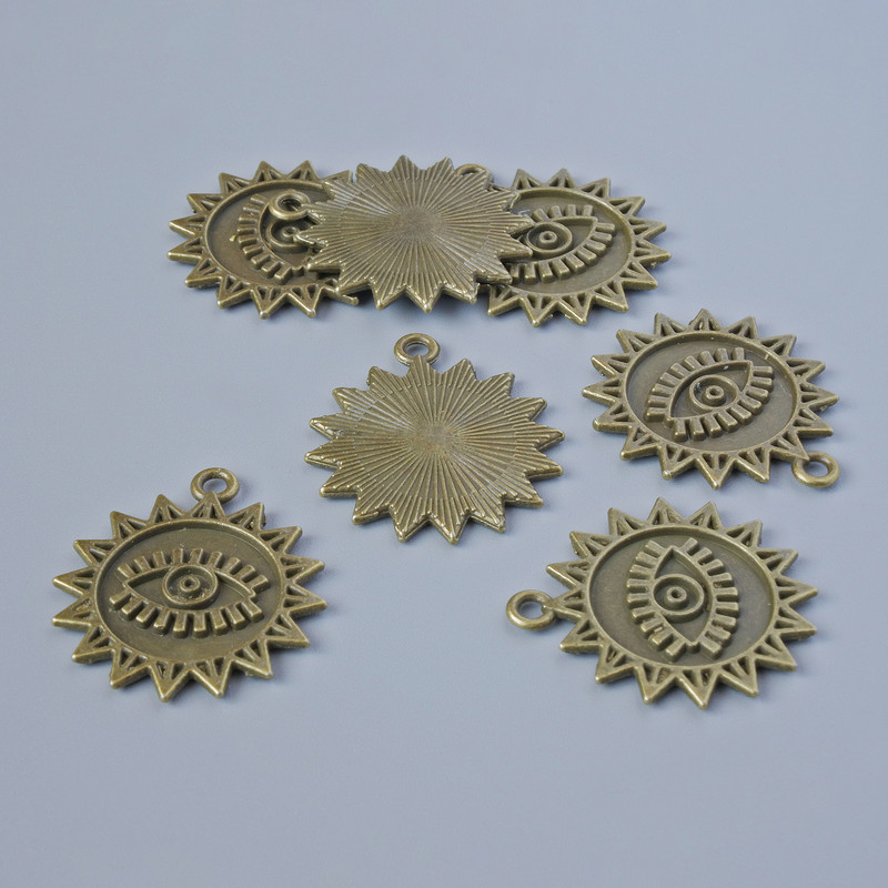 אביזרי תלייה «שמש», קוטר 21,5×19 מ״מ, קוטר החור 1,6 מ״מ, גימור 7 יח' ±, צבע מתכת ברונזה