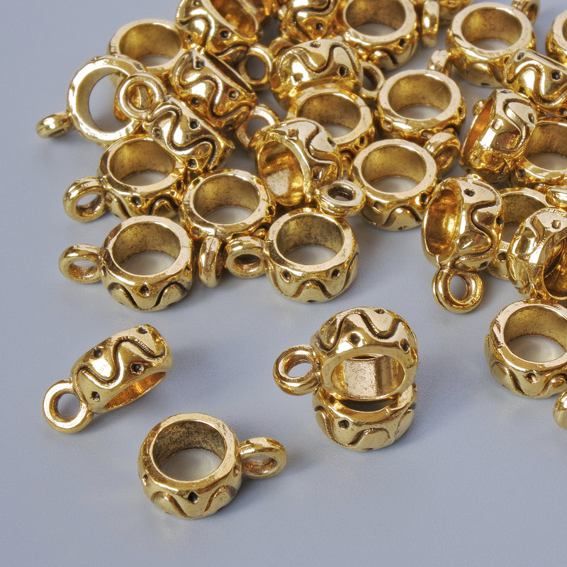 אביזרי בייל-מחזיק, קוטר 3,5×7,5 מ״מ, קוטר חור 1,7 מ״מ, אורך 10 מ״מ, אריזה 41 יח׳ ± 20 גרם ± צבע זהוב של המתכת