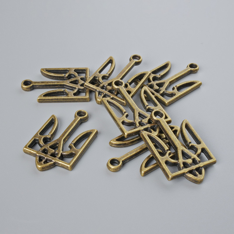 אביזרי תליה – סמל המדינה של אוקראינה, קוטר 15×25 מ״מ ±, אריזה 7 יחידות, צבע מתכת ברונזה