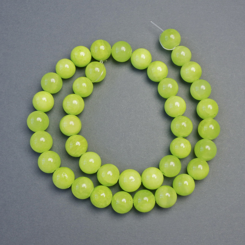 חרוזי אוניקס חלקים בצורת כדור, קוטר 10.5 מ״מ ±, אורך כ-39 ס״מ ± על חוט