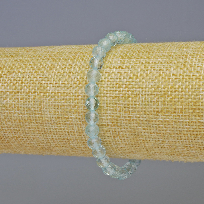 צמיד טופז טבעי – חרוז כדורי משופע בקוטר 6 מ״מ ±, אורך 18 ס״מ ±, אלסטי