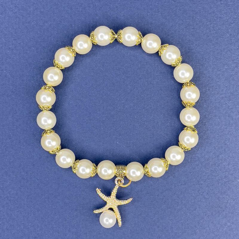 צמיד לבן מאיורקה אקרילי, קוטר 8 מ״מ +/-, אורך 113 ס״מ +/-, אורך 18 ס״מ +/- אלסטי