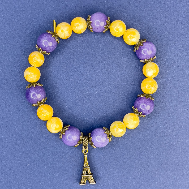 צמיד מג'יידייט עם חרוזים חלקים, קוטר 8.5 מ"מ ±; חרוזי סוגילייט חלקים, קוטר 10.5 מ"מ ±; אורך 18 ס"מ ±; צמיד מתיחה