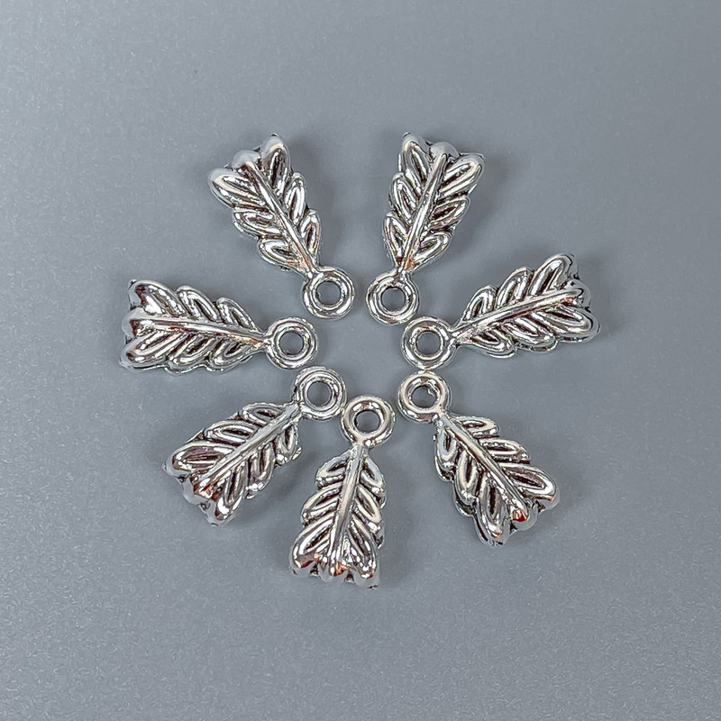 אביזרי בייל בצבע כסף, מידה 14×7×5 מ״מ ± פתחי 2.5 מ״מ ± פתח 1.8 מ״מ ± אריזה 22 יחידות