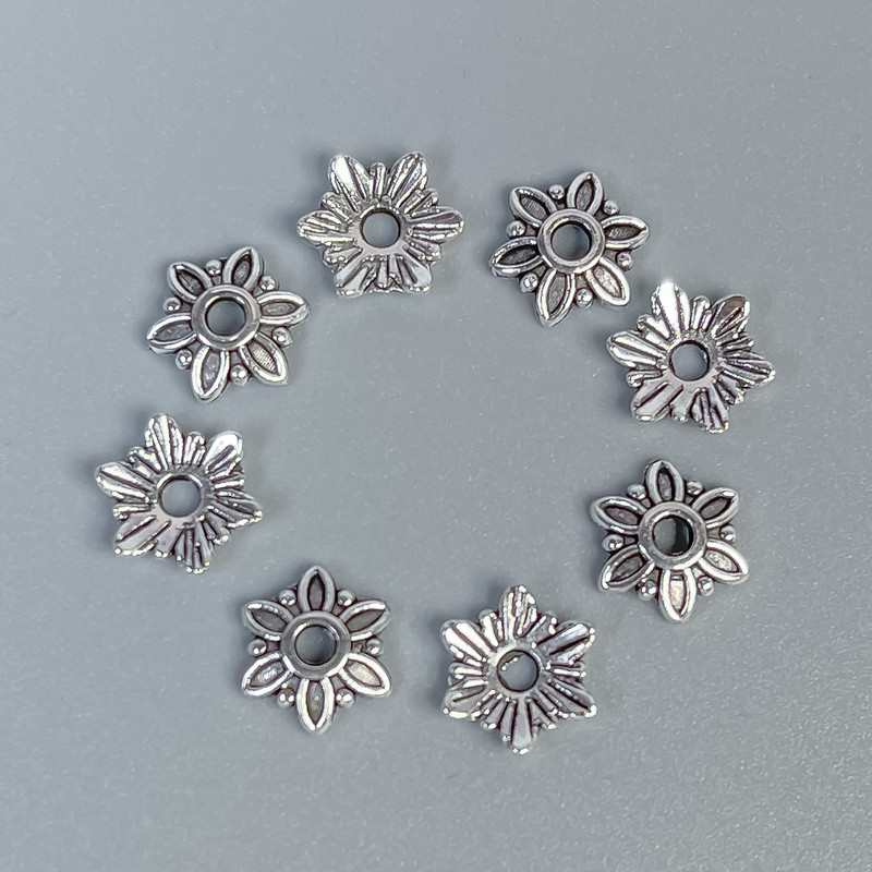 אביזרי כובע חרוז בצבע כסף, קוטר 7×1 מ״מ ± פתח 1.5 מ״מ ± אריזה 80 יחידות